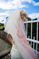 bride with windswept veil at boconnoc house in cornwall